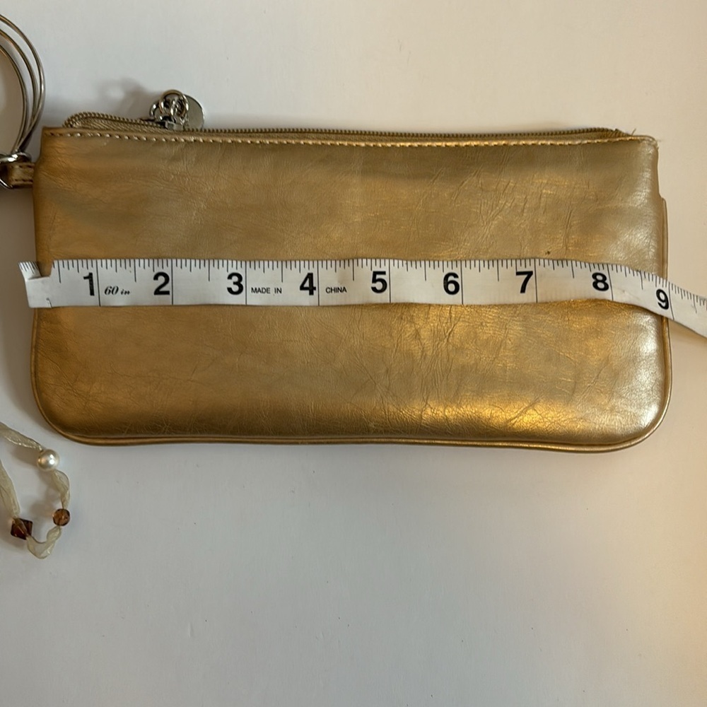 NY&CO GOLD WRISTLET WITH 3 RINGS AS WRISTLET HAS RIBBON DEATTACHABLE ADORNMENT - Picture 4 of 6